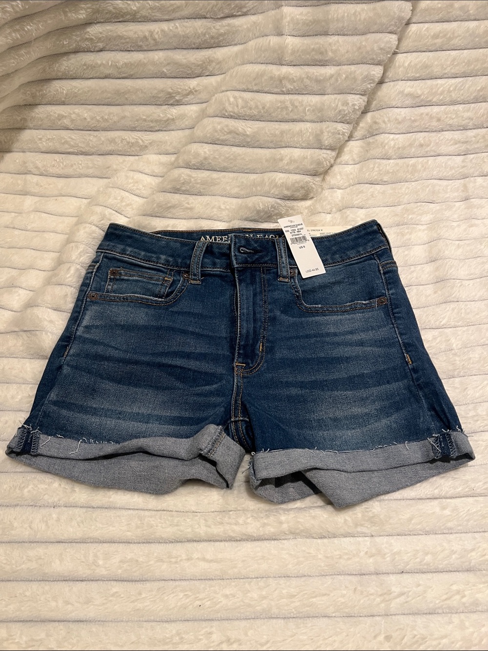 American Eagle Next Level Stretch X Hi-Rise Shortie Hi-Rise Denim Shorts in Blue